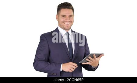 Expressive young businessman with tablet presenting something sw Stock Photo