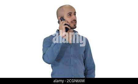 Arabic man talking on the phone on white background. Stock Photo