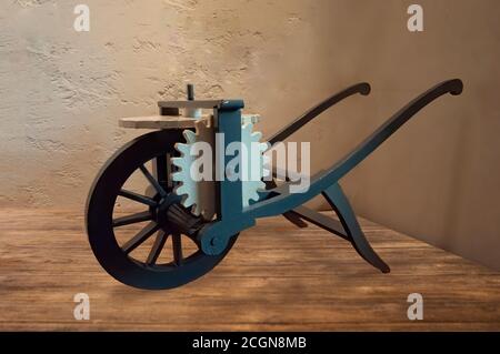 Amboise, France - October 31, 2013: The Waywiser. Moving forward, the wheel of the wheelbarrow drags a horizontal rack plate with holes in it. At each Stock Photo