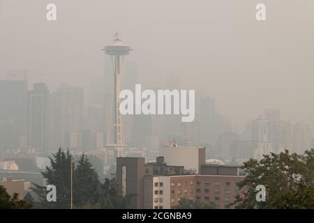 Seattle, USA. 11th Sep, 2020. The normally scenic Kerry Park city skyline, now blanketed with a plume of Wildfire smoke covering the Pacific Northwest. Seattleites are adjusting to a new normal of smokey summers. Wildfires rage yearly now causing a dramatic drop in air quality from the normally crisp clean Washington air. Credit: James Anderson/Alamy Live News Stock Photo