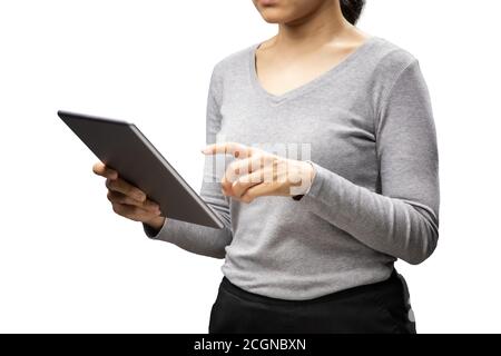 Asian woman finger point at digital tablet isolated on white background Stock Photo