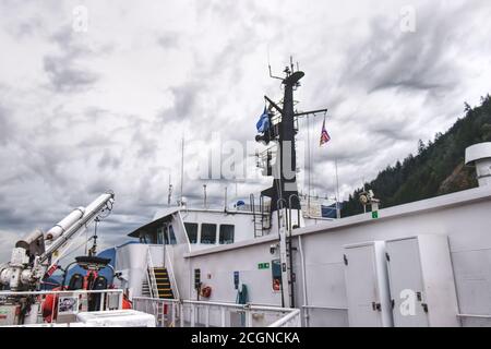 Vancouver, Canada - July 16,2020: View of sundeck of the Queen of Oak Bay Ferry near the Horseshoe Bay Terminal with dark clouds in the background Stock Photo