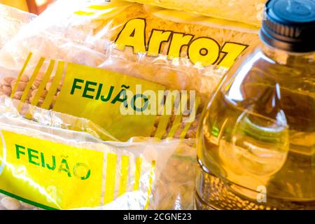 Packet of rice and beans and soy oil. The price of the rice package has ...