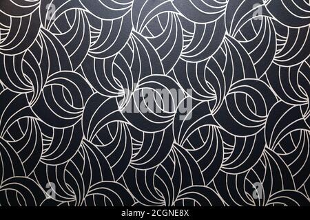 Abstract curved textured dark wallpaper pattern Stock Photo