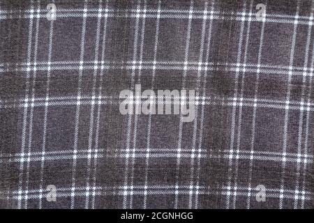 Dark blue plaid pattern of fabric texture with selective focus Stock Photo