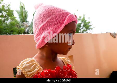 Kalaburagi, Karnataka/India-August, 22.2020: closeup shot of Indian girl child wearing in pink cap Stock Photo