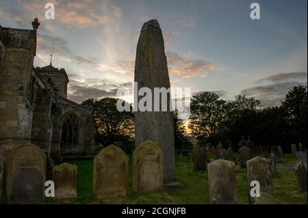 Rudston Monolith in Rudston, East Yorkshire is the tallest prehistoric standing stone in Britain Stock Photo