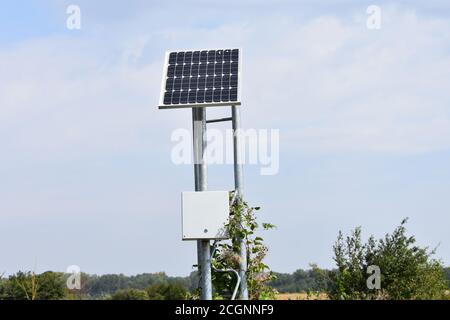 Small Solar panel near local road Stock Photo