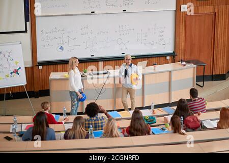Students focused on a lecture in amphitheatre Stock Photo