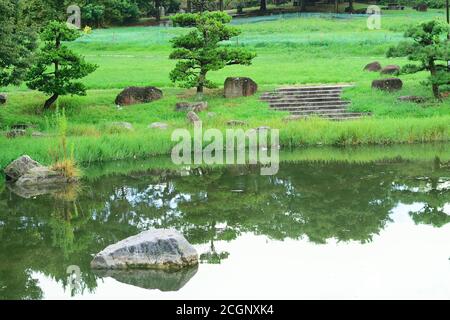 Japanese Landscape garden in lush green Summer Stock Photo