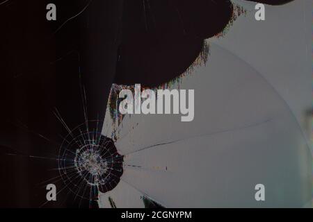 broken lcd tft tn screen flat macro texture with crystal leakage and physical damage cracks, closeup with selective focus and blur Stock Photo