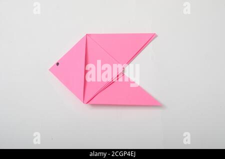 origami fish isolated white background Stock Photo