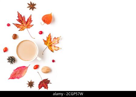 Autumn composition with coffee cup made of autumn leaves, flowers, nuts, berries isolated on white background. Flat lay, top view with copy space Stock Photo