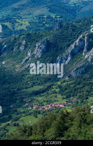 Small town seen from the Chapel of Santa María in Bermiego in the Quirós council, in the Las Ubiñas-La Mesa Natural Park. Asturias. Spain.Europe Stock Photo