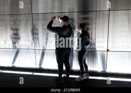 Jersey City, New Jersey, USA. 11th Sep, 2020. Family members of Vincent Gallucci pay tribute to their uncle who's name is listed on the 'Empty Sky Memorial at Liberty State Park in Jersey City, New Jersey. The visitors paid tribute to those lost souls from 2001 World Trade Center attack in New York. Credit: Brian Branch Price/ZUMA Wire/Alamy Live News Stock Photo