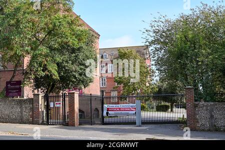 Brighton UK 12th September 2020 -  Cardinal Newman Catholic School and Newman College in Hove Brighton where two members of staff and three students have recently tested positive e for COVID-19 coronavirus . It is believed the students from the Cardinal Newman Sixth Form College had attended a social gathering before the new term began   : Credit Simon Dack / Alamy Live News Stock Photo