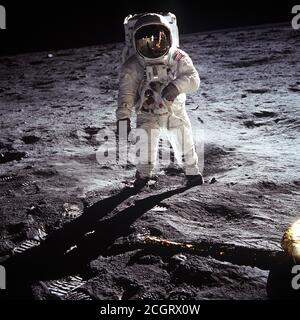 Astronaut Buzz Aldrin, lunar module pilot, walks on the surface of the Moon near the leg of the Lunar Module (LM) 'Eagle' during the Apollo 11 exravehicular activity (EVA). Astronaut Neil A. Armstrong, commander, took this photograph with a 70mm lunar surface camera. While astronauts Armstrong and Aldrin descended in the Lunar Module (LM) 'Eagle' to explore the Sea of Tranquility region of the Moon, astronaut Michael Collins, command module pilot, remained with the Command and Service Modules (CSM) 'Columbia' in lunar orbit.