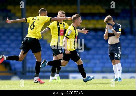 Harrogate Town's Lloyd Kerry (second right) celebrates scoring his side's second goal of the game with his teammates during the Sky Bet League Two match at Roots Hall, Southend. Stock Photo