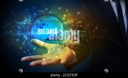 Elegant hand holding BIG DATA inscription, digital technology concept Stock Photo