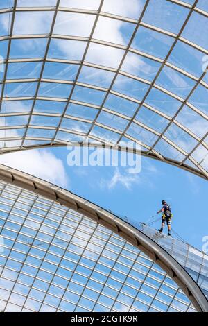 Window cleaner wipes window in the Reichstag in Berlin Stock Photo - Alamy