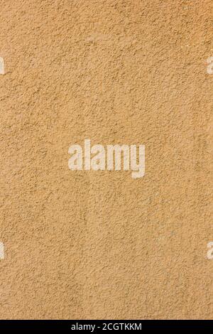 Yellow or orange concrete wall texture as a background Stock Photo