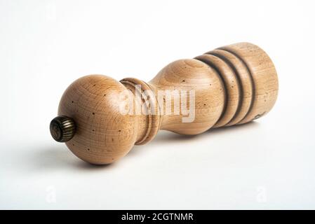 Vidalia, Georgia / USA - May 5, 2020: Studio product shot of the iconic Paris model of the Peugeot pepper mill in natural wood with metal jewel knob. Stock Photo