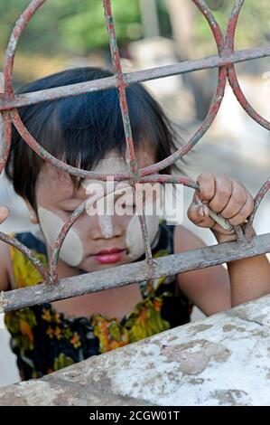 Child begging for money in Old Bagan, Mandalay Region, Myanmar Stock Photo
