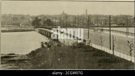 . The street railway review . TKOI.LEV SUPPORTS AT DKAW. driven by a General Electric motor of the encased street railwaytype, attached to the main shaft of the pump. On the fixed spans approaching both ends of the bridge are steeltruss gates which are operated by electric motors placed under-neath the floor of the bridge, the operation is controlled entirelyfrom the operating rooirr of the drawbridge. The gates swing intwo parts and when not in use are in line with the curbing anddirectly over it. The current is carried to the gate motors by asubmerged armor cable. The entire operation of the Stock Photo