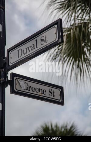 Street sign at the corner of Duval Street and Greene Street in the heart of the party area Stock Photo