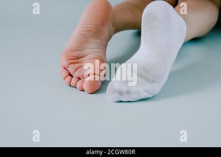 The Guy with Dirty Socks in His Hands on a White Background. Stock Image -  Image of nasty, business: 136821291