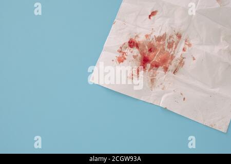 Handkerchief with blood stain Stock Photo - Alamy