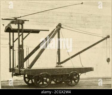Last rail car. Electric locomotive pulling high-speed train on rails ...