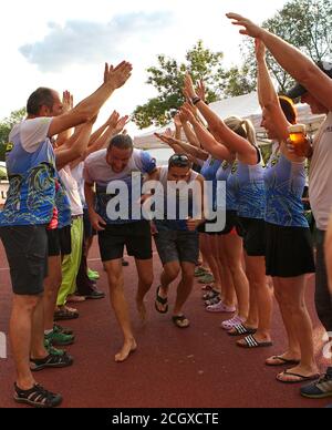 Prague, Czech Republic. 12th Sep, 2020. Paddlers celebrate after the competition at the 23rd Prague Dragon Boat Festival in the Vltava River in Prague, Czech Republic, Sept. 12, 2020. Credit: Dana Kesnerova/Xinhua/Alamy Live News Stock Photo