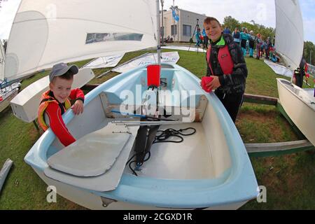 Minsk, Belarus. 12th Sep, 2020. Two boys prepare their single-handed dinghy boats before the competition for selecting elites for the national team in Minsk, Belarus, Sept. 12, 2020. Credit: Henadz Zhinkov/Xinhua/Alamy Live News Stock Photo