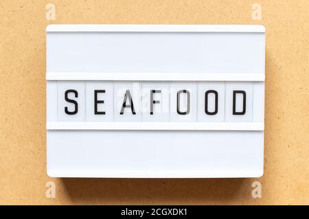 Lightbox with word seafood on wood background Stock Photo
