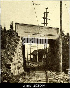 . Electric railway journal . 4 miles westfrom the Waterbury-Middlebury town line, is of entirelydifferent type. It consists of a 36-ft. non-reinforced con-crete arch. The wing walls and parapets of this bridge aremade of rubble which gives a pleasing rustic appearanceto the structure. The track construction between Waterbury and Wood-bury substation is of 80-lb. A.S.C.E. rail and beyond thatpoint a 60-lb. A.S.C.E. rail is used, all connected with six-bolt angle joints and bonded with two No. 0000 concealedbonds. Throughout the entire route the 8-ft. ties are spaced24 in. centers and laid in gr Stock Photo