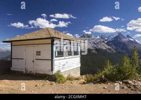 Heritage Fire Lookout Wood Building Structure Exterior. Scenic Canadian Rocky Mountain Peaks Landscape, Yoho National Park, British Columbia, Canada Stock Photo