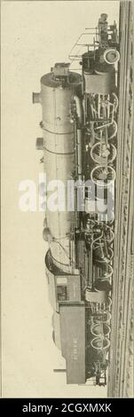 . Railway age gazette . n space. The brick arch is supported by six ZV^ in.arch tubes, and is supplemented by the brick wall through whichheated air is delivered by seven 3 in. pipes, placed vertically in it.The fire doors are of the Franklin vertical type, two in number,placed 32^^ in. between centers. The locomotive will be fired bya Street mechanical stoker. The Schmidt superheated is the largest ever applied to a loco-motivv.-, laving 53 elements and 1,584 sq. ft. of superheatingsurfa. c. The header is divided, separate castings being pro-vided i or the saturated and the superheated steam. Stock Photo