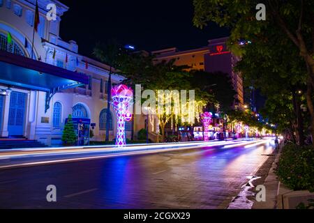 A night neon town at Nguyen Hue street in Ho Chi Minh wide shot
