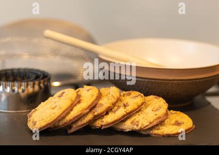White chocolate chick cookies sitting on top of the cooker having just come from the oven. Stock Photo