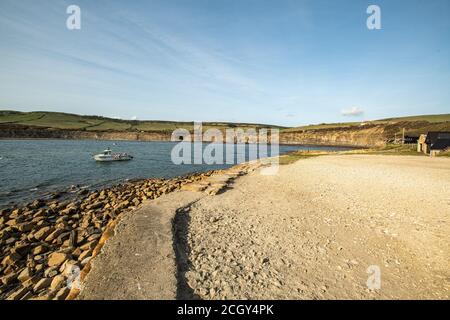 Kimmeridge Bay, Dorset, UK. 12 September, 2020. The sunshine brought visitors out to Kimmeridge Bay for fishing, diving, and snorkelling. Temperatures hit the high twenties Saturday as the UK sees the return of warm weather. Credit: Sidney Bruere/Alamy Live News Stock Photo