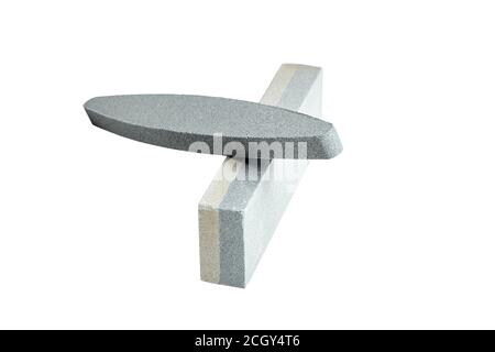 Two Sharpening stones. Grindstone or whetstone sharpener, isolated on white background. Kitchen utensils Stock Photo