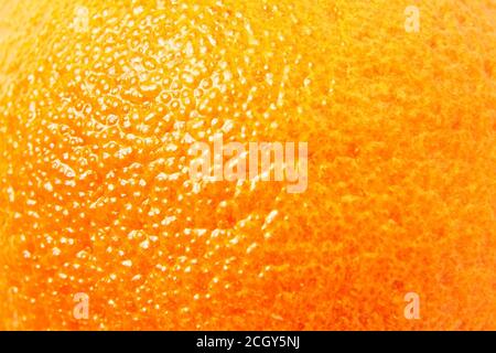 Mandarin, mandarine, tangerine orange skin texture close up details. Pimples Stock Photo