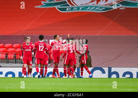 Liverpool defender Virgil van Dijk (4) scores a goal and celebrates to make the score 2-1 during the English championship Premier League football matc Stock Photo