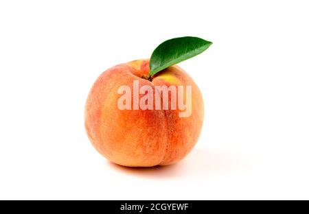 Fresh sweet peach with green leaf isolated on white background. Peach fruits Stock Photo