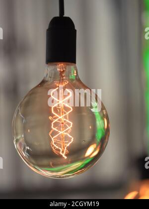 closeup on decorative vintage light bulb with LED filament Stock Photo