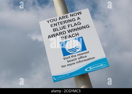 You are now entering a lie flag award winning beach sign on the beach at Alum Chine in Bournemouth, Dorset on a crisp April morning. 27 April 2013. Ph Stock Photo