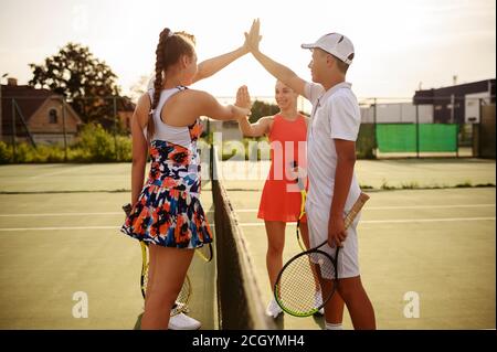 Mixed doubles tennis competition, outdoor court Stock Photo