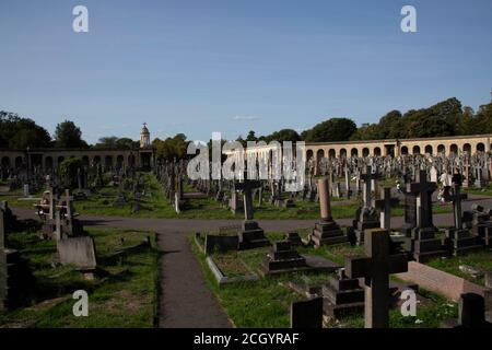 The colonnades and gravestones in Brompton Cemetery - originally the West of London and Westminster Cemetery - Kensington and Chelsea, London UK Stock Photo