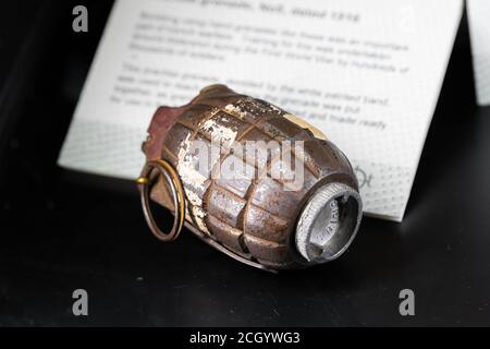 A British WW2 grenade on display in a museum. Old and rusty  Stock Photo